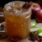 cozy slow cooker apple cider with cinnamon sticks - featured image